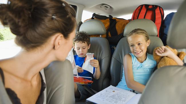 We bet this picture perfect family doesn’t fight in the car. Although that smile does look kind of fake.