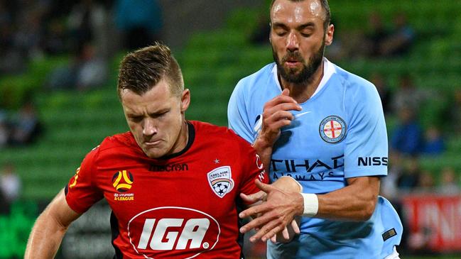 Adelaide United’s Scott Galloway during the clash against Melbourne City. (Photo by Vince Caligiuri/Getty Images)