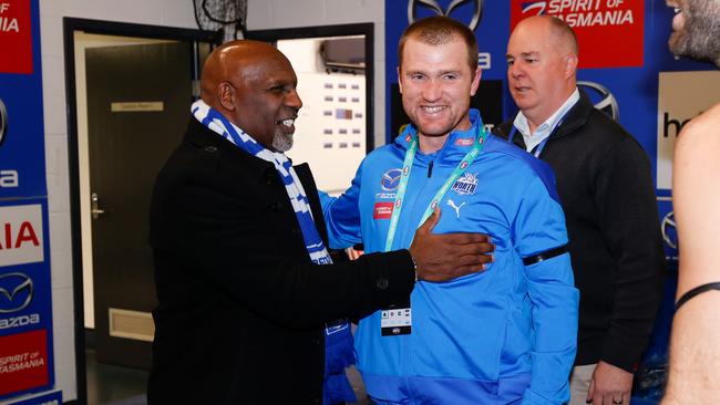 North Melbourne CEO Ben Amarfio with caretaker coach Leigh Adams after the win. Picture: Michael Willson/AFL Photos