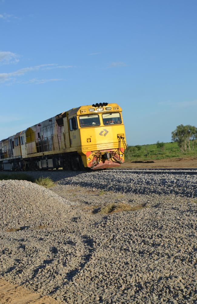 An Aurizon train on the Mount Isa line. Despite Aurizon running the trains, QR is still responsible for scheduling train movements. Credit: Queensland Rail