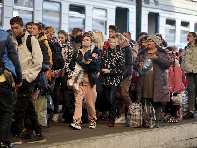 People fleeing the war arrive at the central train station on the train from Dnipro in Lviv, Ukraine. Picture: Getty Images