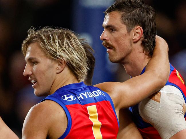 MELBOURNE, AUSTRALIA - JUNE 07: Joe Daniher of the Lions celebrates a goal with teammate Kai Lohmann during the 2024 AFL Round 13 match between the Western Bulldogs and the Brisbane Lions at Marvel Stadium on June 07, 2024 in Melbourne, Australia. (Photo by Dylan Burns/AFL Photos via Getty Images)