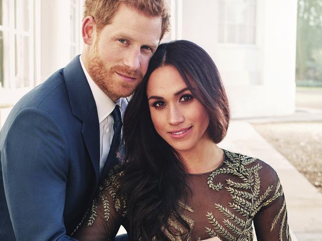 Prince Harry and Meghan’s official engagement photo. Her dress was worth $102,000. Picture: AP