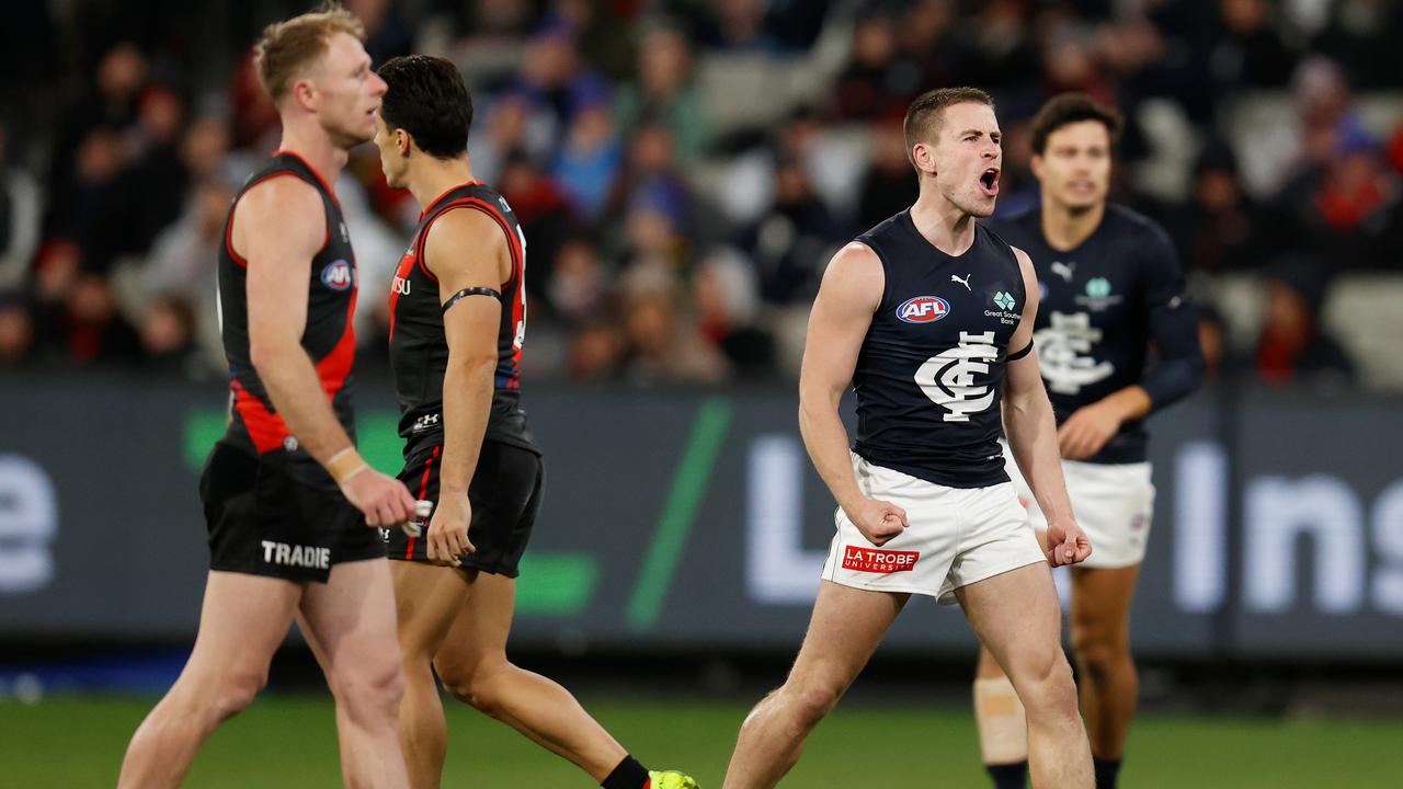 MELBOURNE, AUSTRALIA - JUNE 10: Matthew Owies of the Blues celebrates a goal during the 2022 AFL Round 13 match between the Essendon Bombers and the Carlton Blues at the Melbourne Cricket Ground on June 10, 2022 in Melbourne, Australia. (Photo by Michael Willson/AFL Photos via Getty Images)