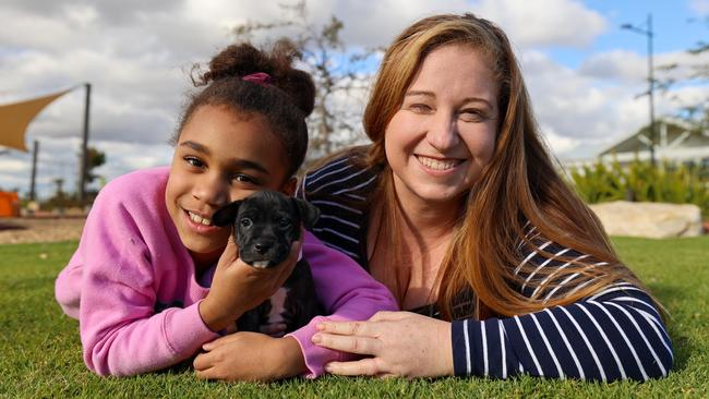 Riverlea residents Chloe and her daughter Lilly with their new puppy Leah. Picture: Supplied