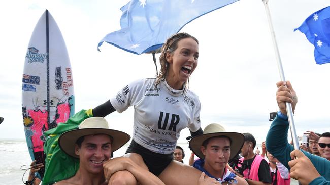 TAHARA, JAPAN - SEPTEMBER 22:  Sally Fitzgibbons of Australia celebrates winning the women's final of the ISA World Surfing Games at the Pacific Long Beach on September 22, 2018 in Tahara, Aichi, Japan.  (Photo by Matt Roberts/Getty Images)