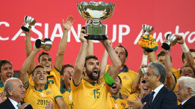 Socceroos captain Mile Jedinak his team celebrate after Australia beat South Korea in the 2015 Asian Cup final. Picture: Getty Images
