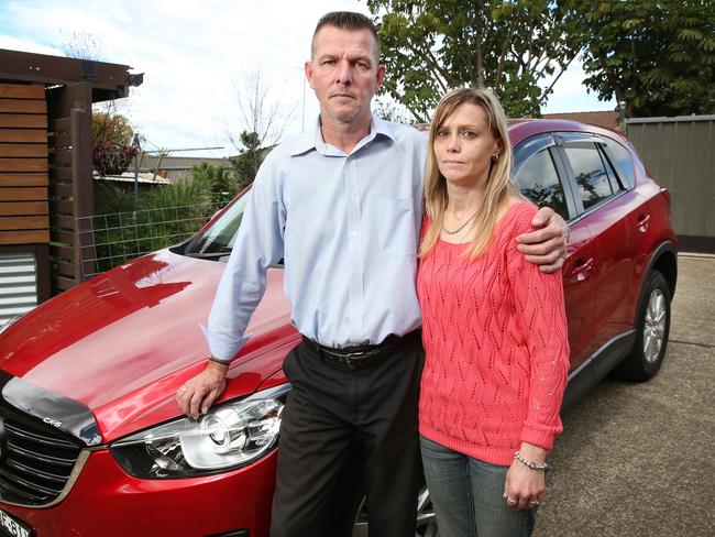 Darren May and Mel Williams at their home in Cranebrook with their Mazda CX5 / Picture: Richard Dobson