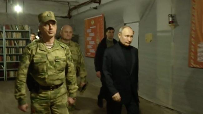 Russian President Vladimir Putin visits Russian national guard headquarters in the Luhansk region in eastern Ukraine. Picture: AFP