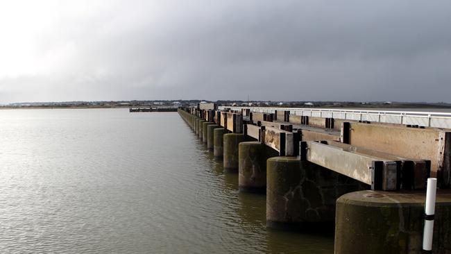 The system of five barrages, consisting of 593 gates, was built from 1935 to 1940 to stop seawater entering the lower lakes. It is now reaching the end of its design life.