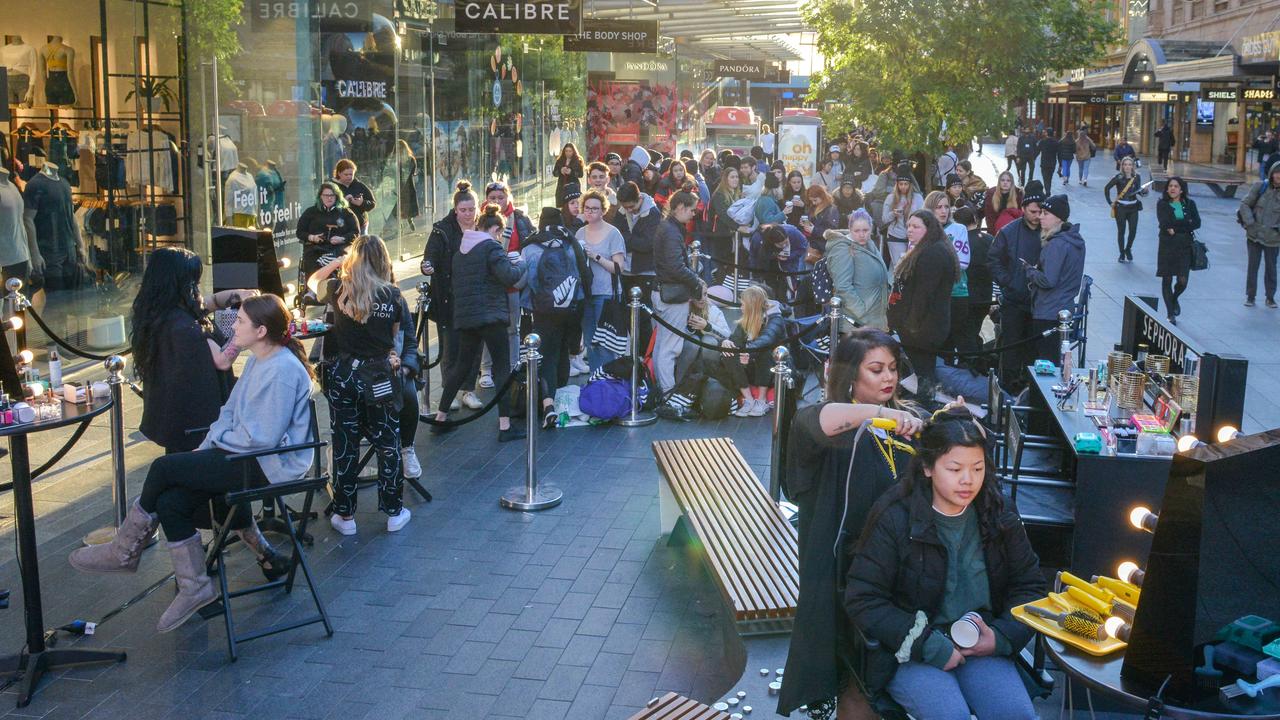 A line of people stretching to North Terrace waiting for the opening of Sephora in Rundle Mal on Thursday, October 10, 2019 Picture: AAP/Brenton Edwards