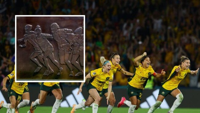 The moment and the mural. Photos: News Corp