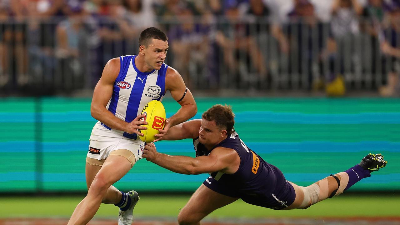 Luke Davies-Uniacke breaks a tackle. Picture: Paul Kane/Getty Images