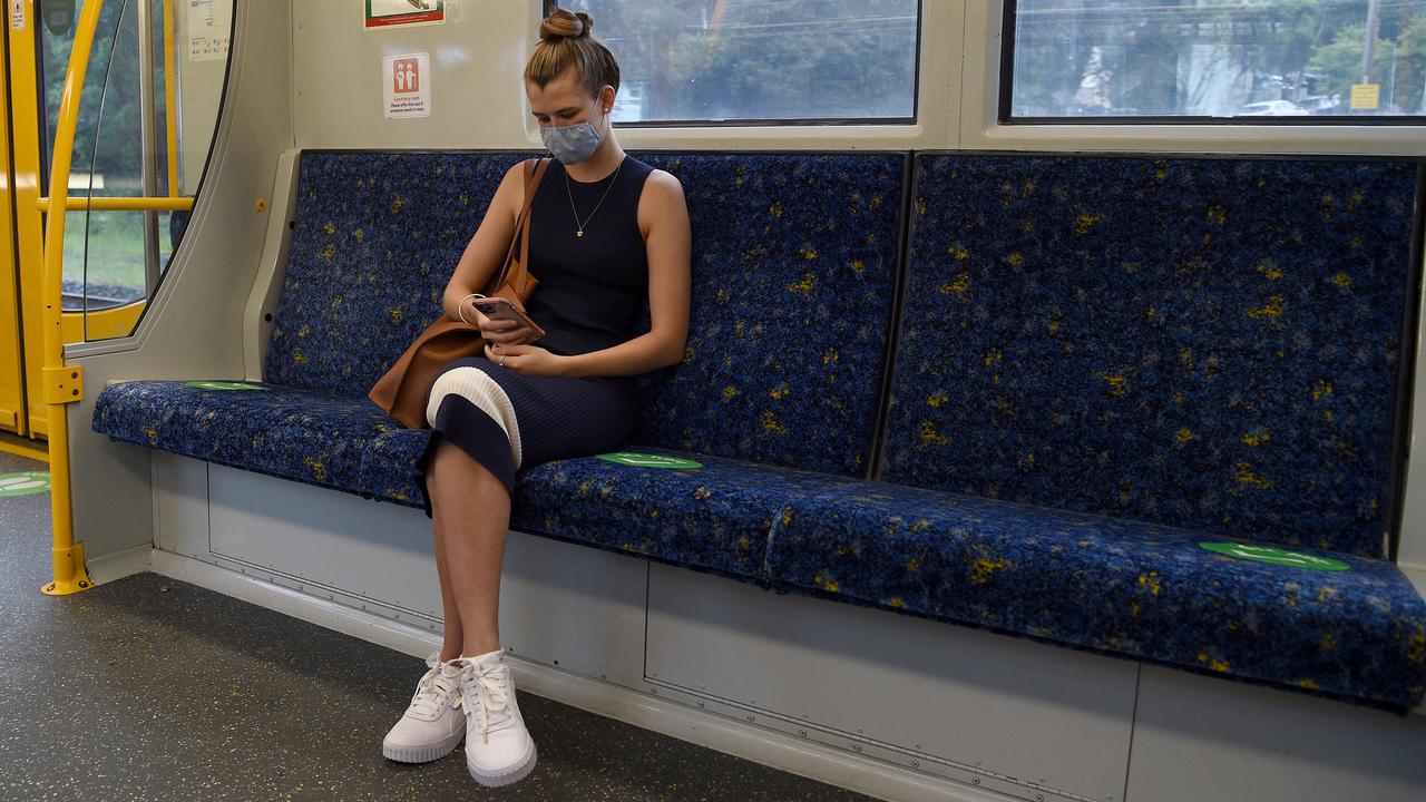 Train commuter Erin Roper (right) says ‘no-one’ has paid attention to the green dots for quite a while. Picture: NCA NewsWire/Bianca De Marchi