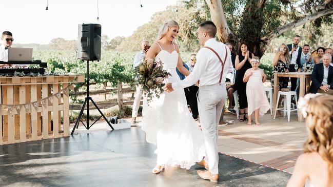 Newlyweds dance outdoors at Lake Breeze. Picture: Goldlight Photography