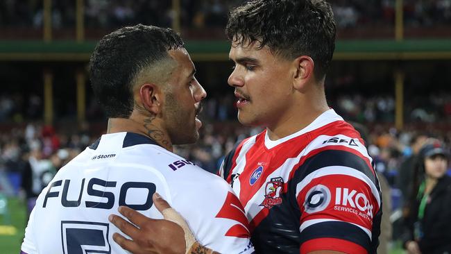 Roosters Latrell Mitchell celebrates victory at full time with Melbourne's Josh Addo-Carr after the Sydney Roosters v Melbourne Storm NRL Preliminary Final at the SCG. Picture: Brett Costello