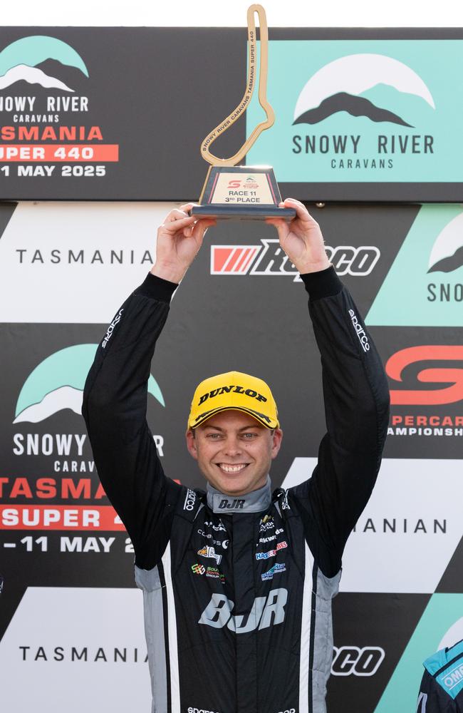 Bryce Fullwood celebrating his third place finish in Tasmania. Picture: Daniel Kalisz/Getty Images