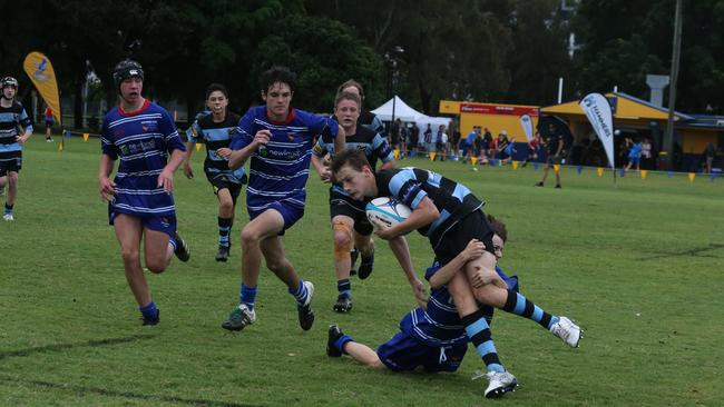Day 1 of the King of the Country junior rugby union tournament at the Gold Coast Eagles Rugby Union Club.Maroochydore Swans (BLUE AND BLACK) vs USQ Saints (Blue ) Maroochydore Player No USQ Player No Pic Mike Batterham