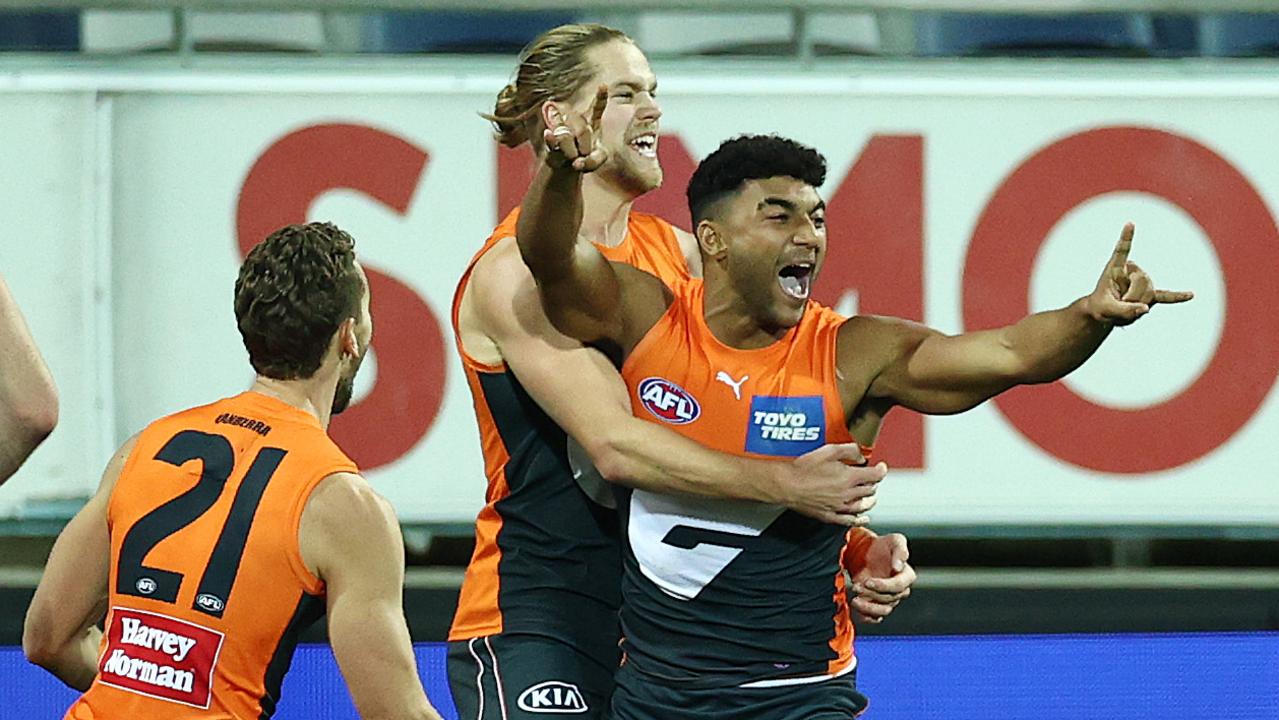 Callum Brown of the Giants celebrates his first AFL goal. Picture: Michael Klein