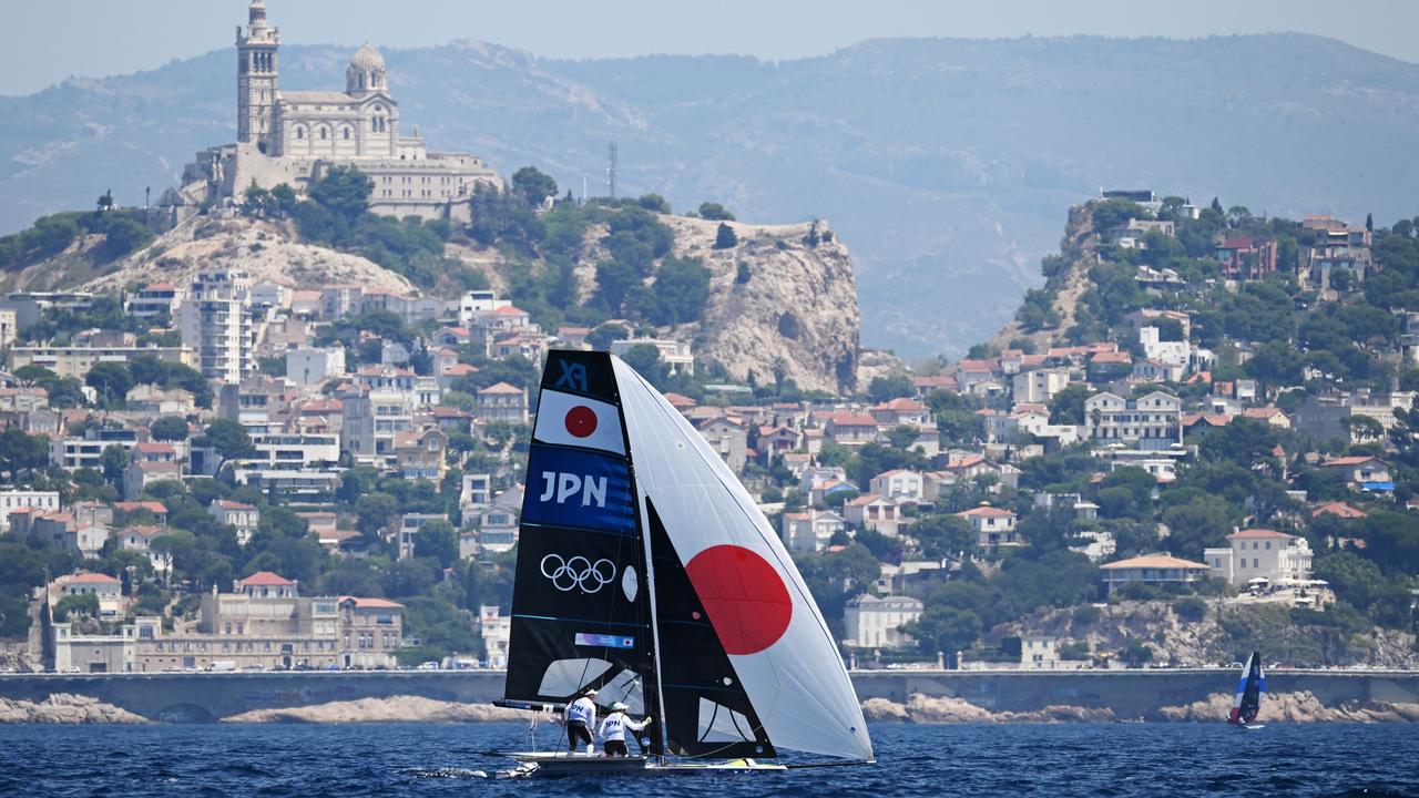 Misaki Tanaka and Sera Nagamatsu of Team Japan compete in the women’s skiff on day one against a stunning backdrop. Picture: Clive Mason/Getty Images