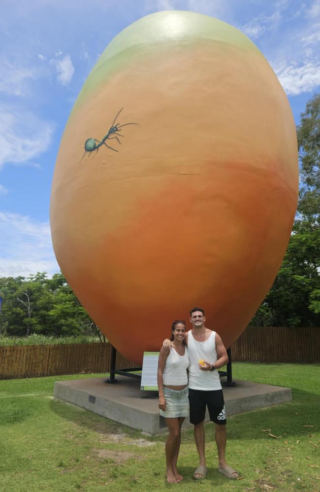 Mary Fowler and Nathan Cleary stopped at the Big Mango on December 30 during their QLD road trip.