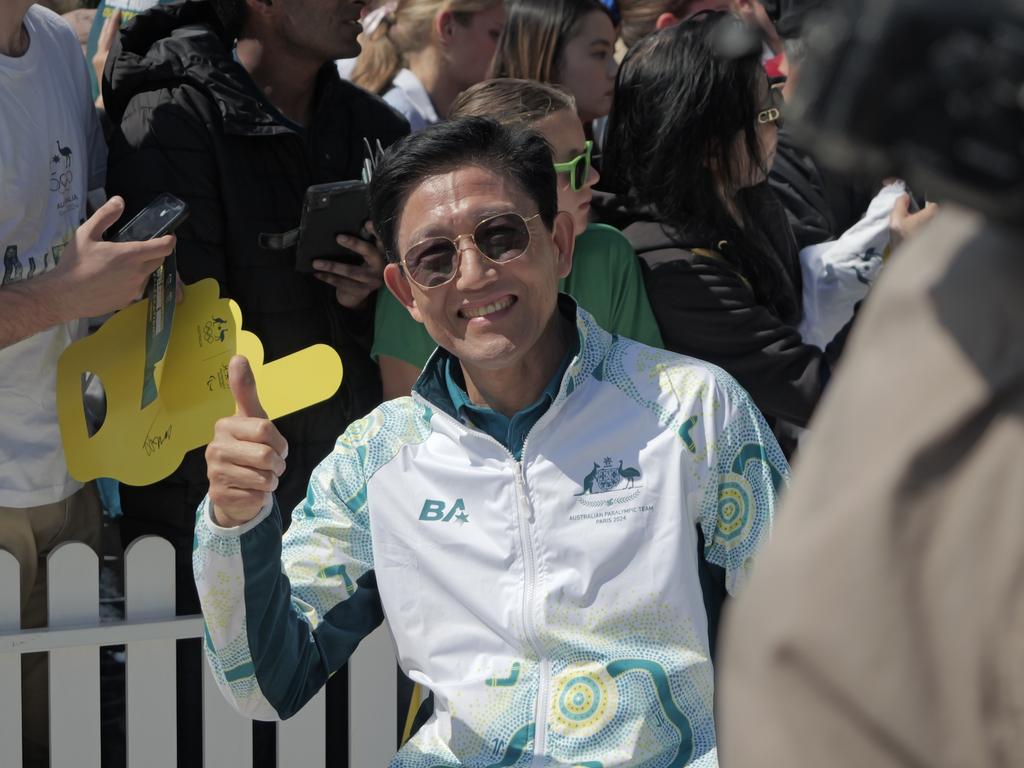 Jimmy Huo lapping up the celebrations at the Welcome Home Celebration at Tumbalong Park. Picture: Ikko Ehode Arimoto