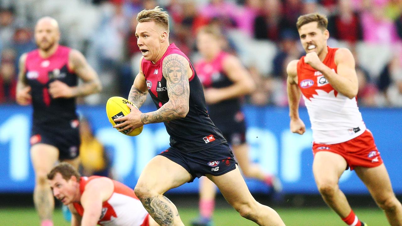 James Harmes speeds away from Jake Lloyd at the MCG a fortnight ago.