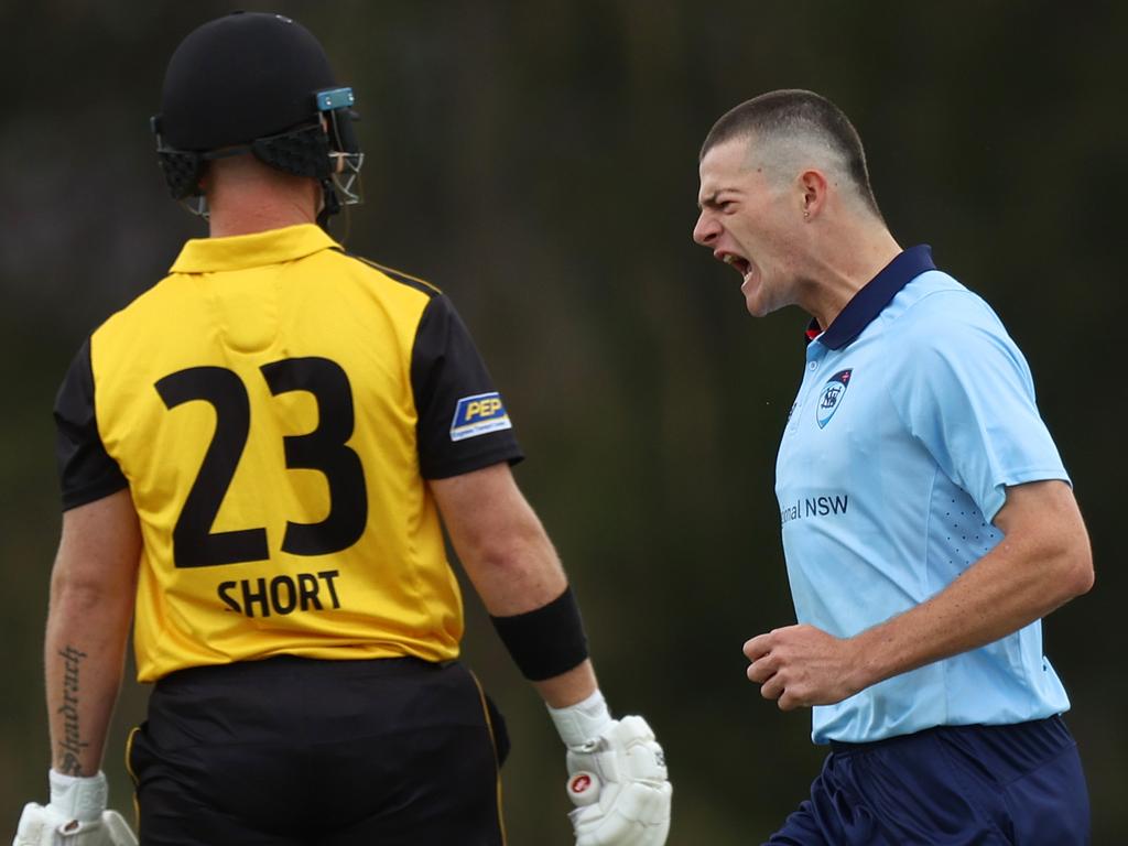 Will Salzmann celebrates a wicket for NSW.