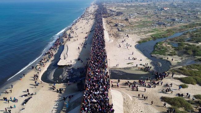 Displaced Gazans walk towards Gaza City on January 27. Picture: AFP