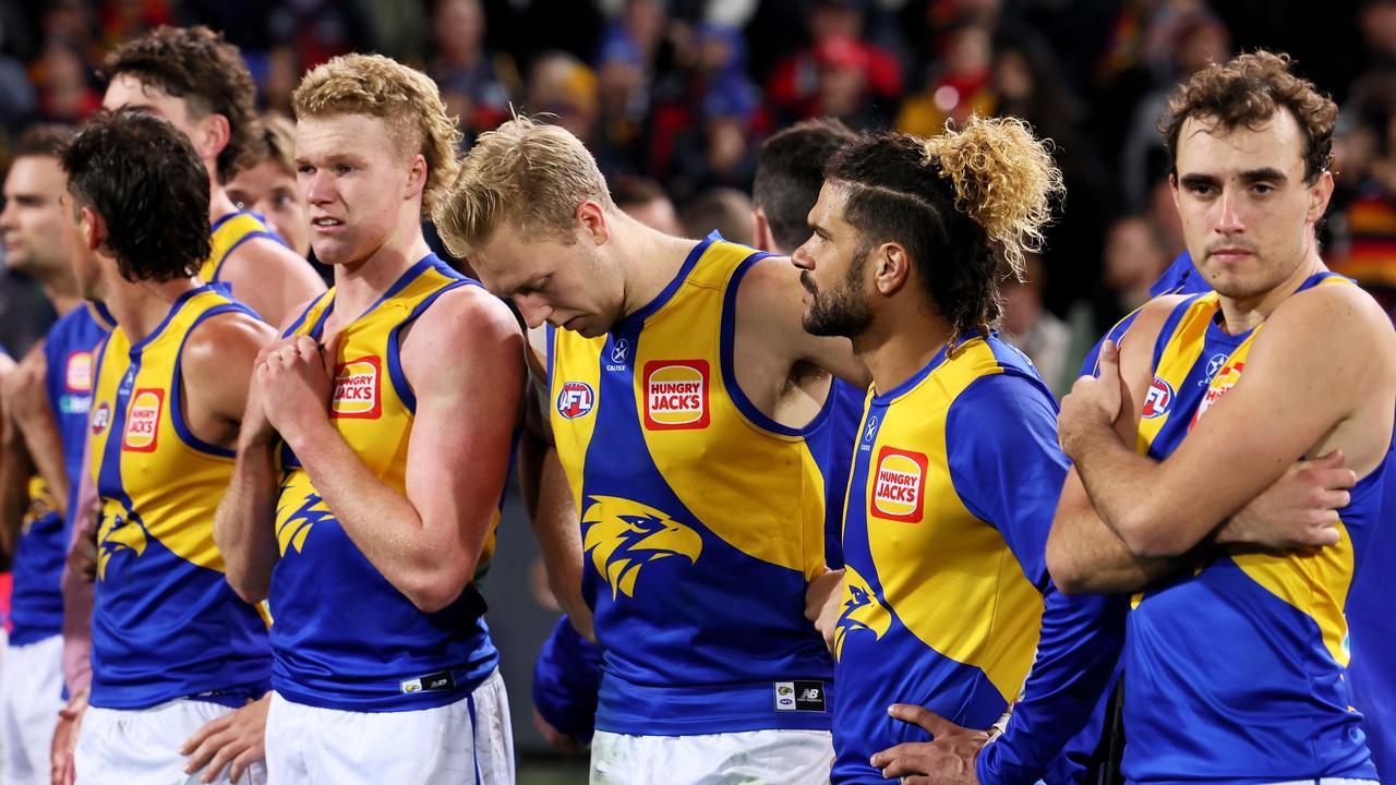 The Eagles look despondent after their loss to the Crows in Adelaide. Picture: James Elsby