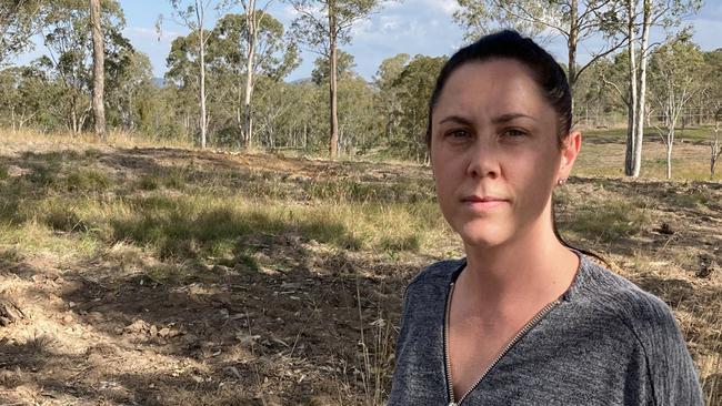 Southside resident Krystal White outside one of the recently cleared blocks of land west of the city, which she said has been home to koalas.