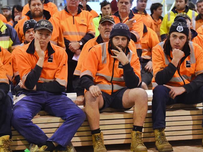 The Labor Government has reached agreement with the ASH shareholders to buy the Heyfield Timber Mill. ASH workers gather for the announcement of the government take over. Picture: Tony Gough