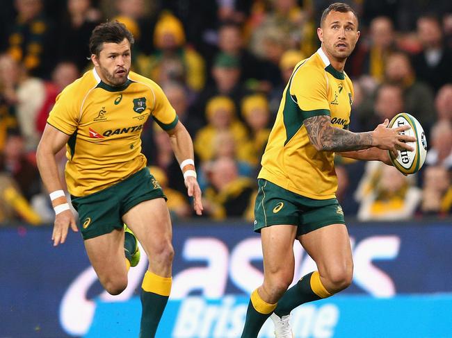 BRISBANE, AUSTRALIA - JULY 18: Quade Cooper of the Wallabies runs the ball during The Rugby Championship match between the Australian Wallabies and the South Africa Springboks at Suncorp Stadium on July 18, 2015 in Brisbane, Australia. (Photo by Cameron Spencer/Getty Images)