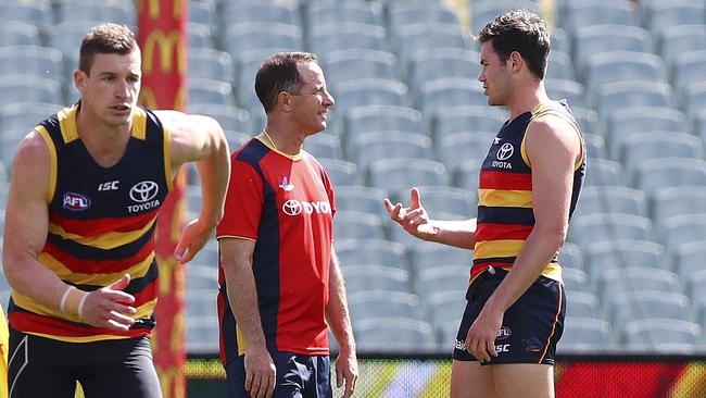 Don Pyke chats to Mitch McGovern before ruling him out of last year’s grand final after a hamstring injury. Picture Sarah Reed