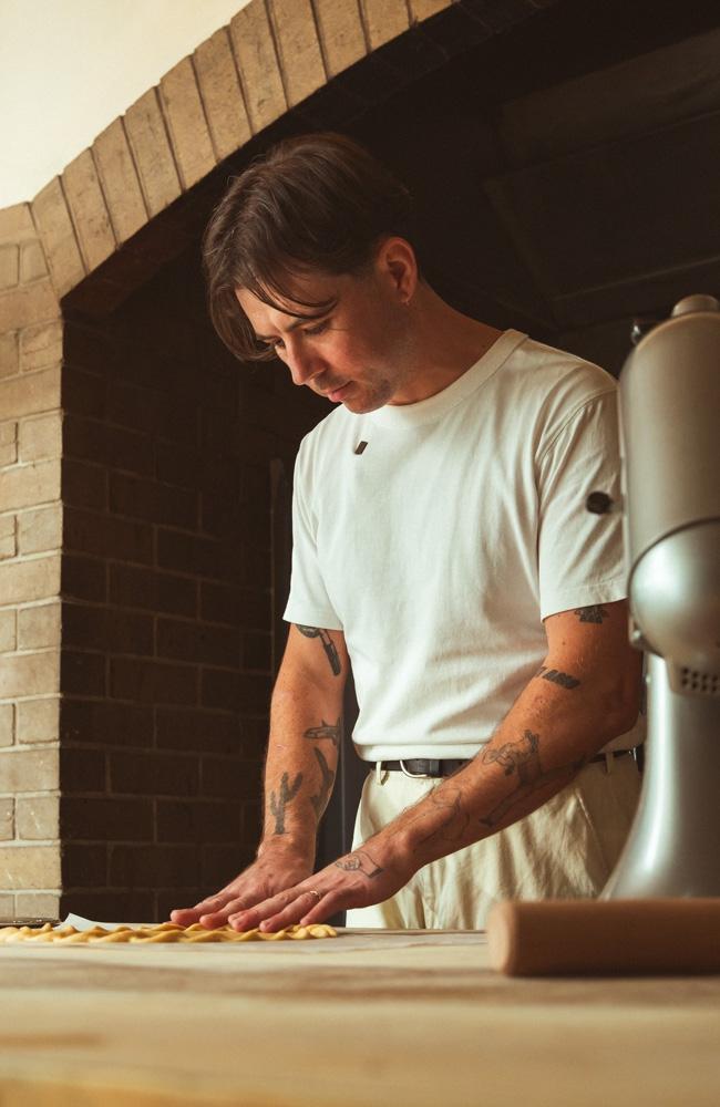 Mitch Suchowacki, Head baker at Agnes Bakery, preparing his Peach and Almond Galette. Photo: Dexter Kim