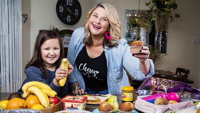 Chrissie with her daughter Annabelle,7, hate school’s lunchbox monitoring and bans on sharing food. Picture: Nicole Cleary