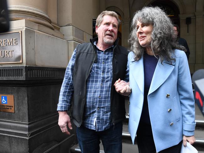 Advocates Chrissie Foster (right) and Rob Walsh leave the Supreme Court of Victoria in Melbourne, Wednesday, August 21, 2019. (AAP Image/Erik Anderson) NO ARCHIVING