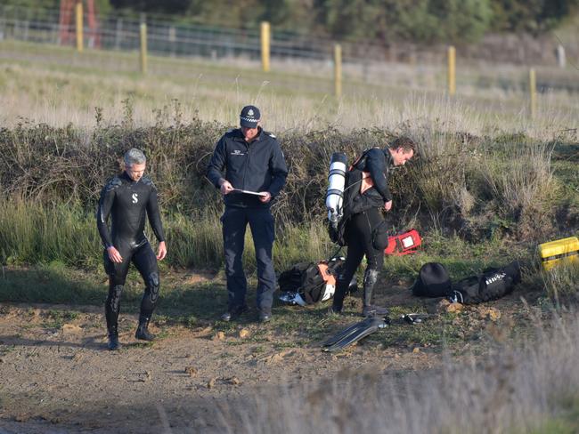 Victorian Police divers during a search for missing Ballarat mum Samantha Murphy, several months after her disappearance. Picture: Ian Wilson