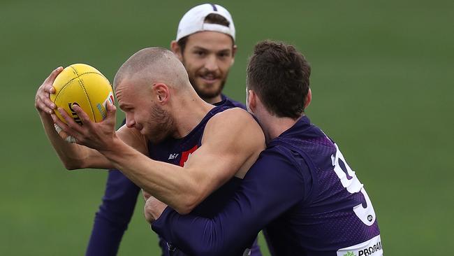 Blake Acres tackles Brett Bewley during a Fremantle training session. Picture: Paul Kane/Getty Images)