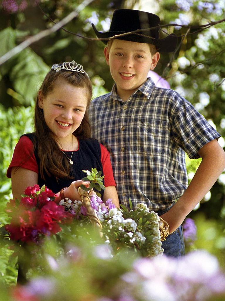 Flower Girl winner Naomi Begg, 8, with last year’s Page Boy winner brother Luke Manton-Begg, 10, gearing up for the 2000 Carnival of Flowers in Toowoomba. Pic: David Martinelli