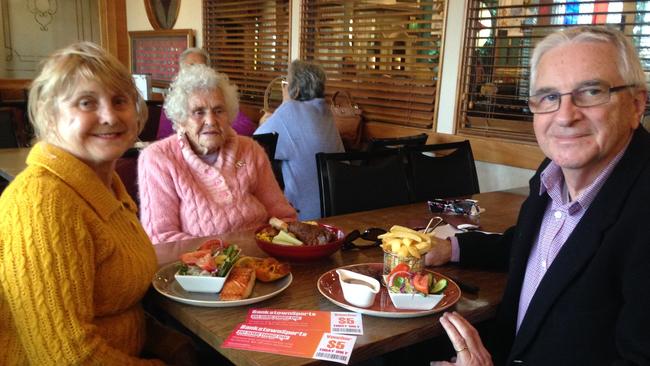 Eating lunch on DoSomething Day at Bankstown Sports Club is Robyn Newman, with her mum Norma Grant and Robyn's husband Ross Fleming.