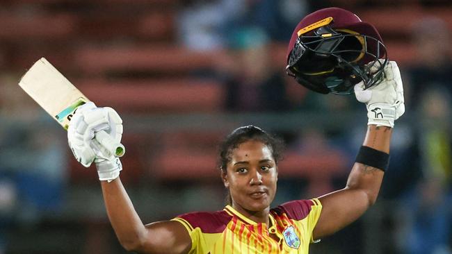 Hayley Matthews of the West Indies reacts after reaching her century during the T20 international women cricket match against Australia at the North Sydney Oval in Sydney on October 2, 2023. (Photo by DAVID GRAY / AFP) / -- IMAGE RESTRICTED TO EDITORIAL USE - STRICTLY NO COMMERCIAL USE --