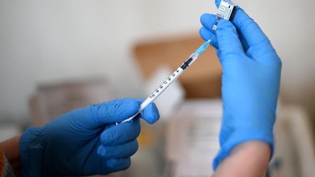 Vaccination remains the best defence of Australians against both flu and Covid. Picture: AFP