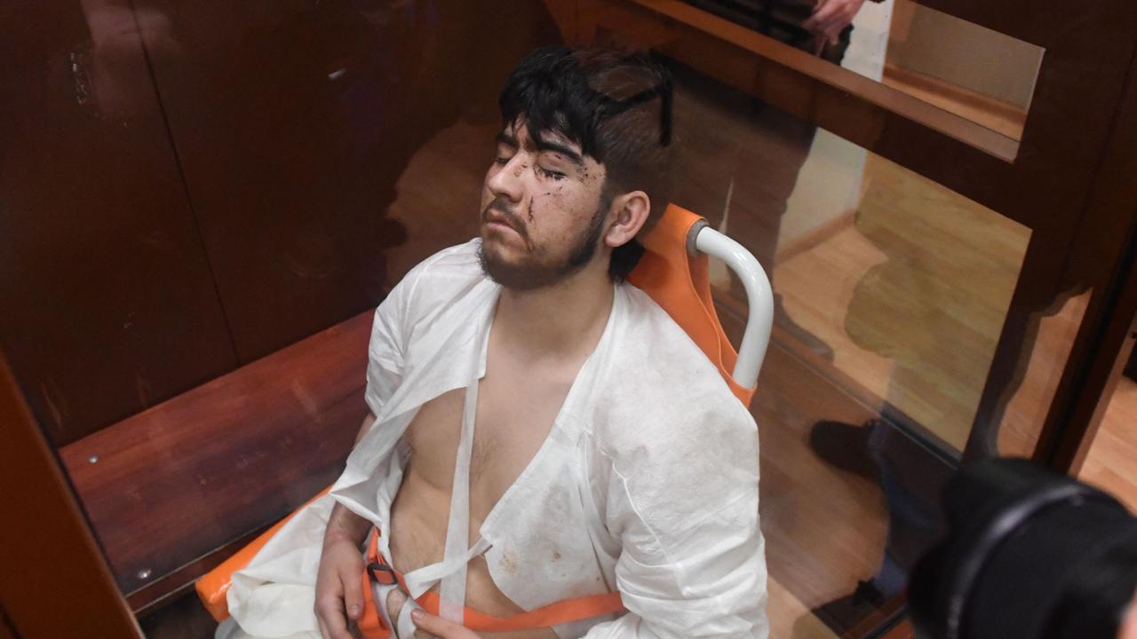 A suspect in the attack of a concert hall that killed 137 people, the and claimed by the Islamic State jihadist group, sits inside the defendant cage as he waits for his pre-trial detention hearing at the Basmanny District Court in Moscow. Picture: AFP