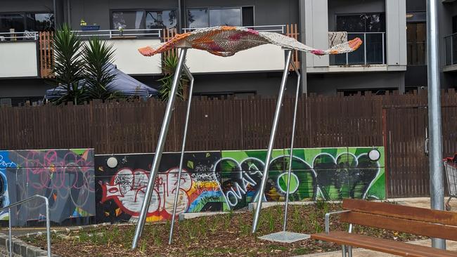 One of the flying jumpers sculptures in “Melbourne’s saddest playground”. Picture: Supplied