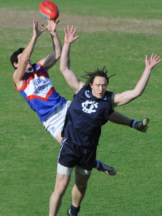 Shane Harvey uses Aaron Johnson as a step ladder in 2012.