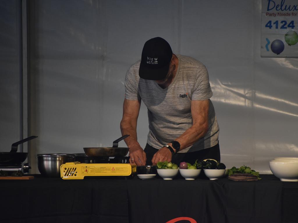 Celebrity chef Matt Golinski prepares food at a cooking demonstration at Relish Food and Wine Festival. Photo: Stuart Fast.