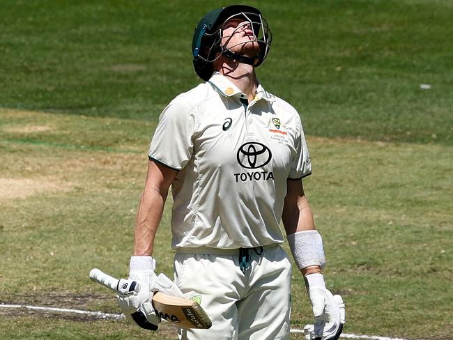 Australia's Steve Smith leaves the field after being dismissed. Picture: Martin Keep/AFP