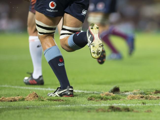 Chewed up surface after a scrum during the Super Rugby match between the Waratahs and Queensland Reds at the SCG. Picture: Craig Golding