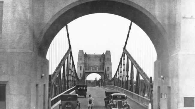 Collecting tolls on the Indooroopilly Traffic Bridge, as it was then called, in 1936.